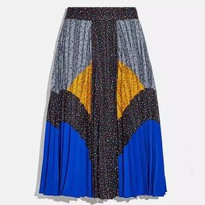 Coach Color-block, accordion-pleated skirt. NWT